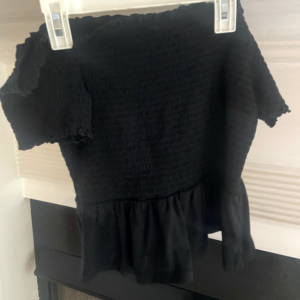 Black cropped off the shoulder
